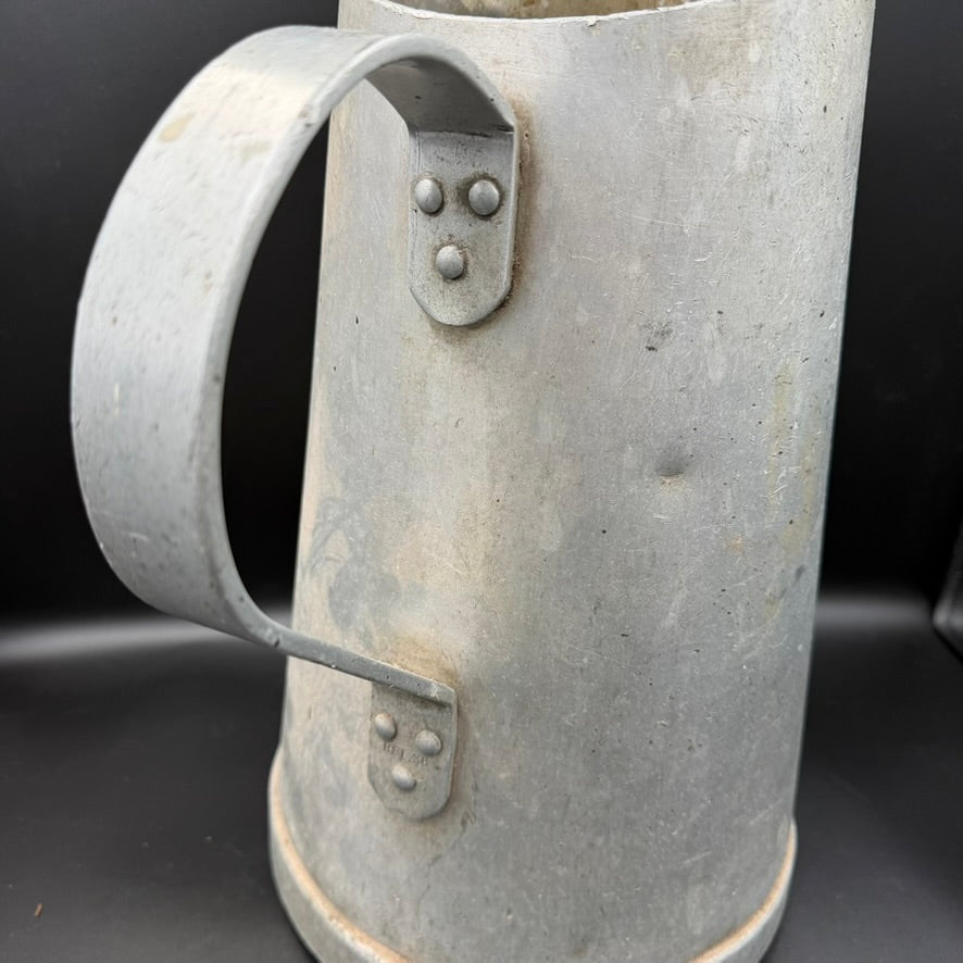 Detail of riveted handle construction on WW2 German aluminium jug