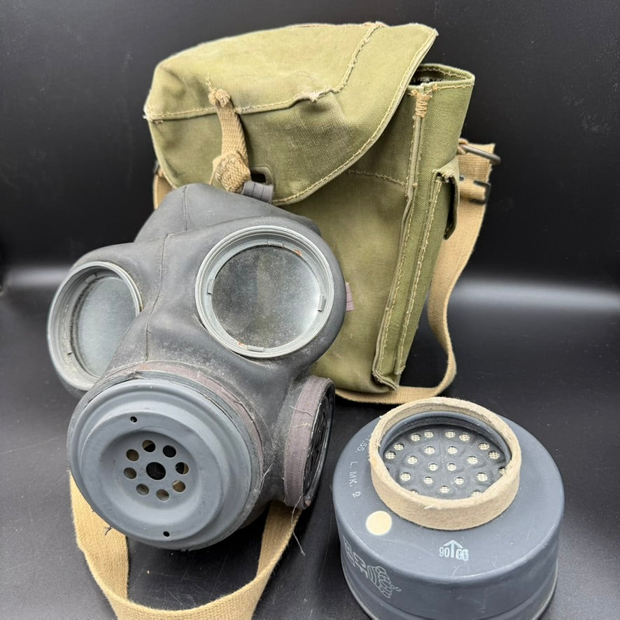 WW2 British gas mask dated 1944 with original canvas carry bag