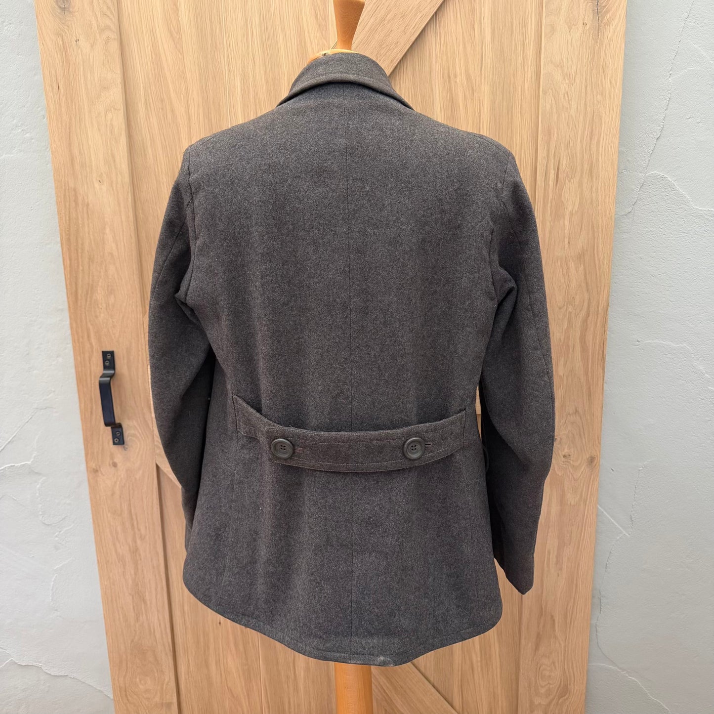 Rear view of WWII German private purchase Luftwaffe-style coat with back belt detail