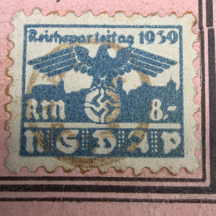 Close-up of original NSDAP party contribution stamp dated 1939 on German WWII membership card
