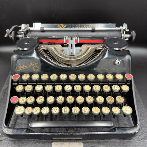 Original WWII Rheinmetall typewriter with SS key, complete machine, front view