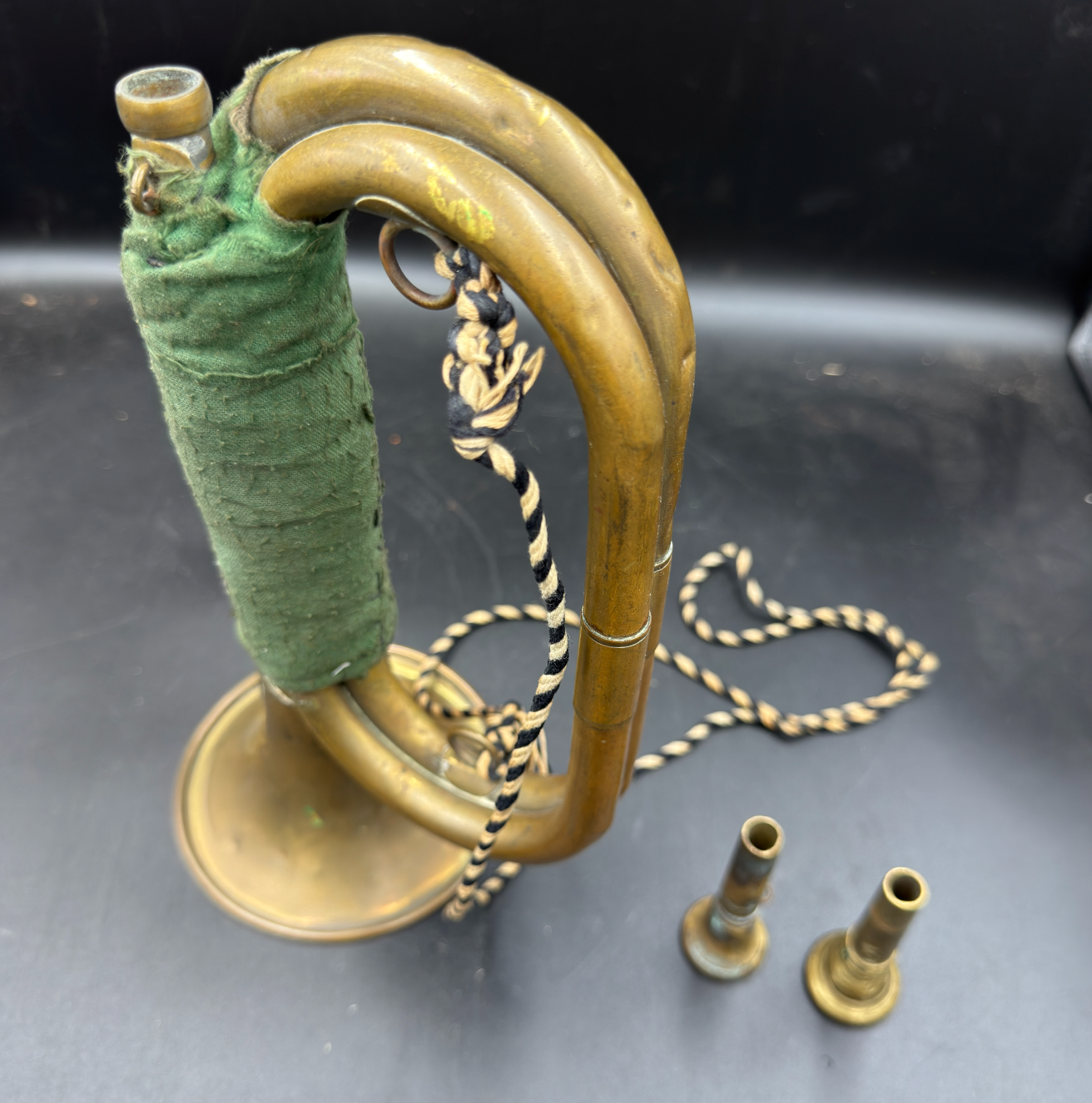 Two original mouthpieces accompanying early German SA bugle